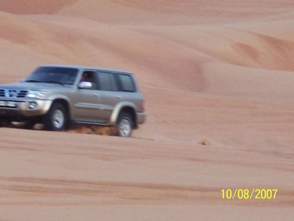 A vehicle on the desert sands